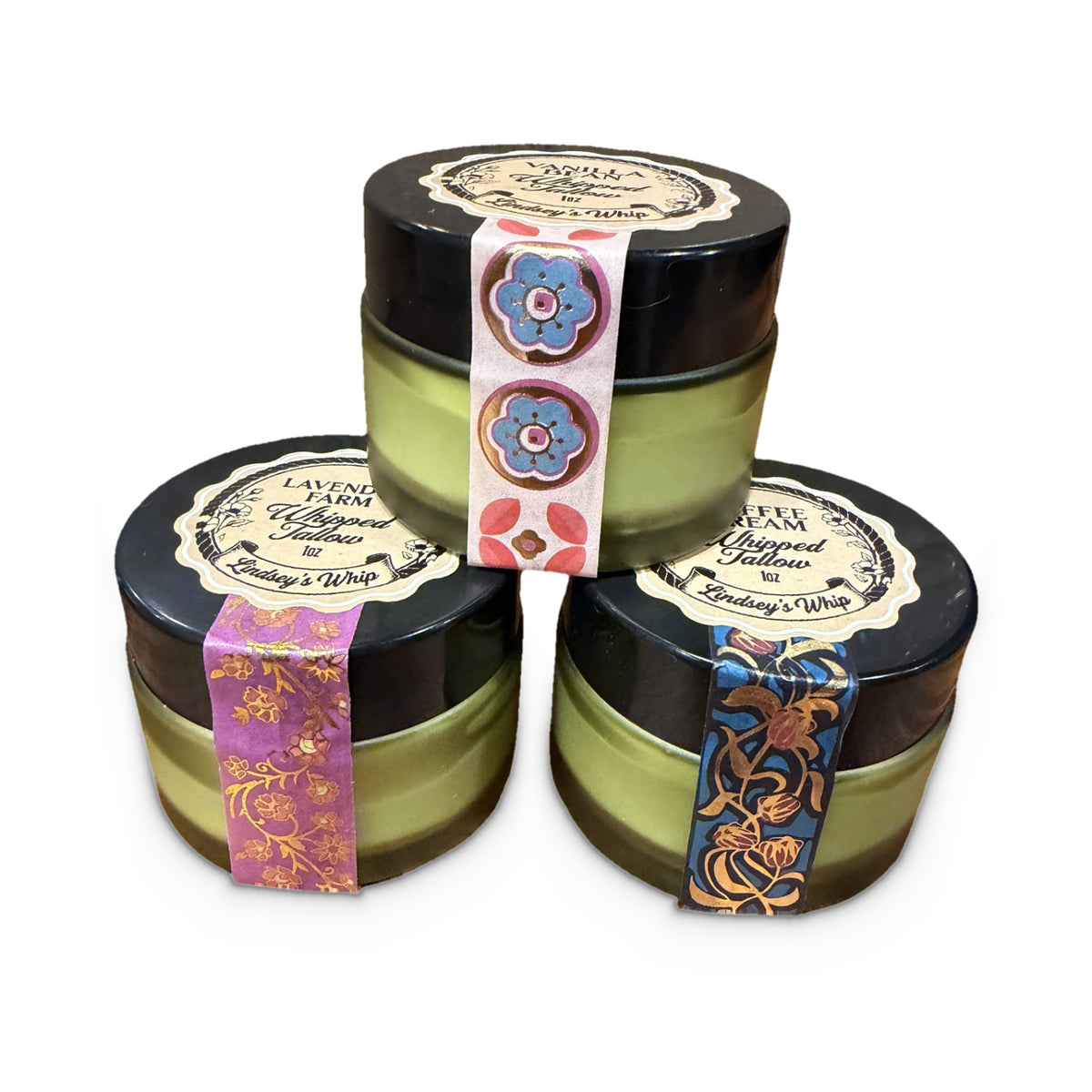 Stack of three Lindsey's Whip 1 oz jars, Vanilla Bean, Coffee Cream and Lavender Farm whipped tallow